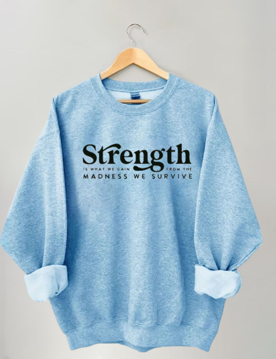 Strength Is What We Gain From The Madness We Survive Sweatshirt