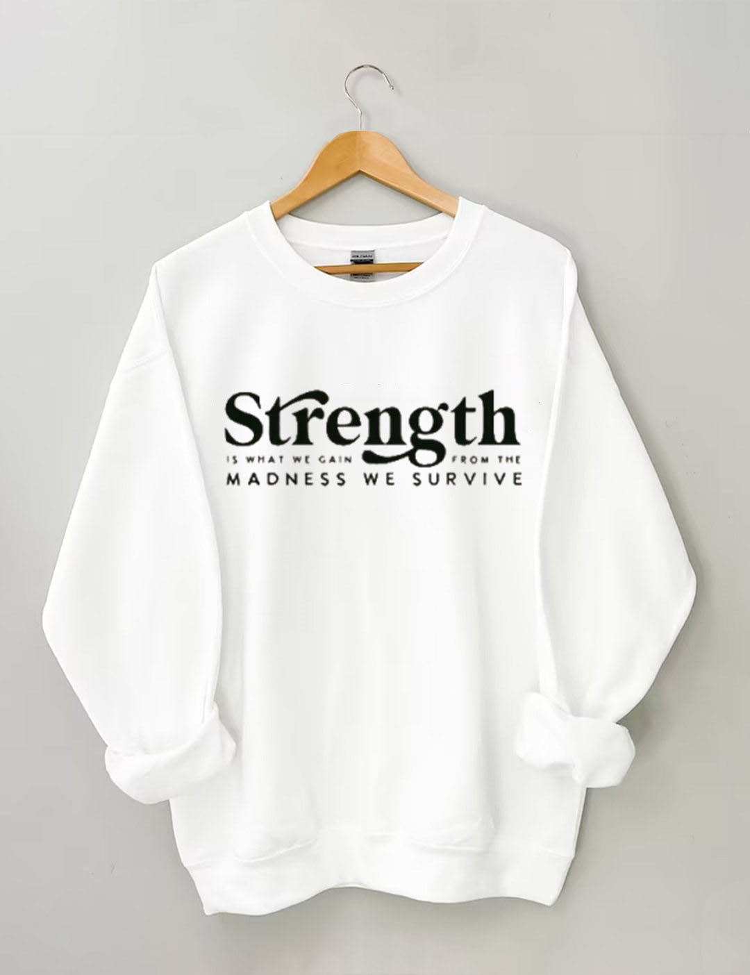 Strength Is What We Gain From The Madness We Survive Sweatshirt