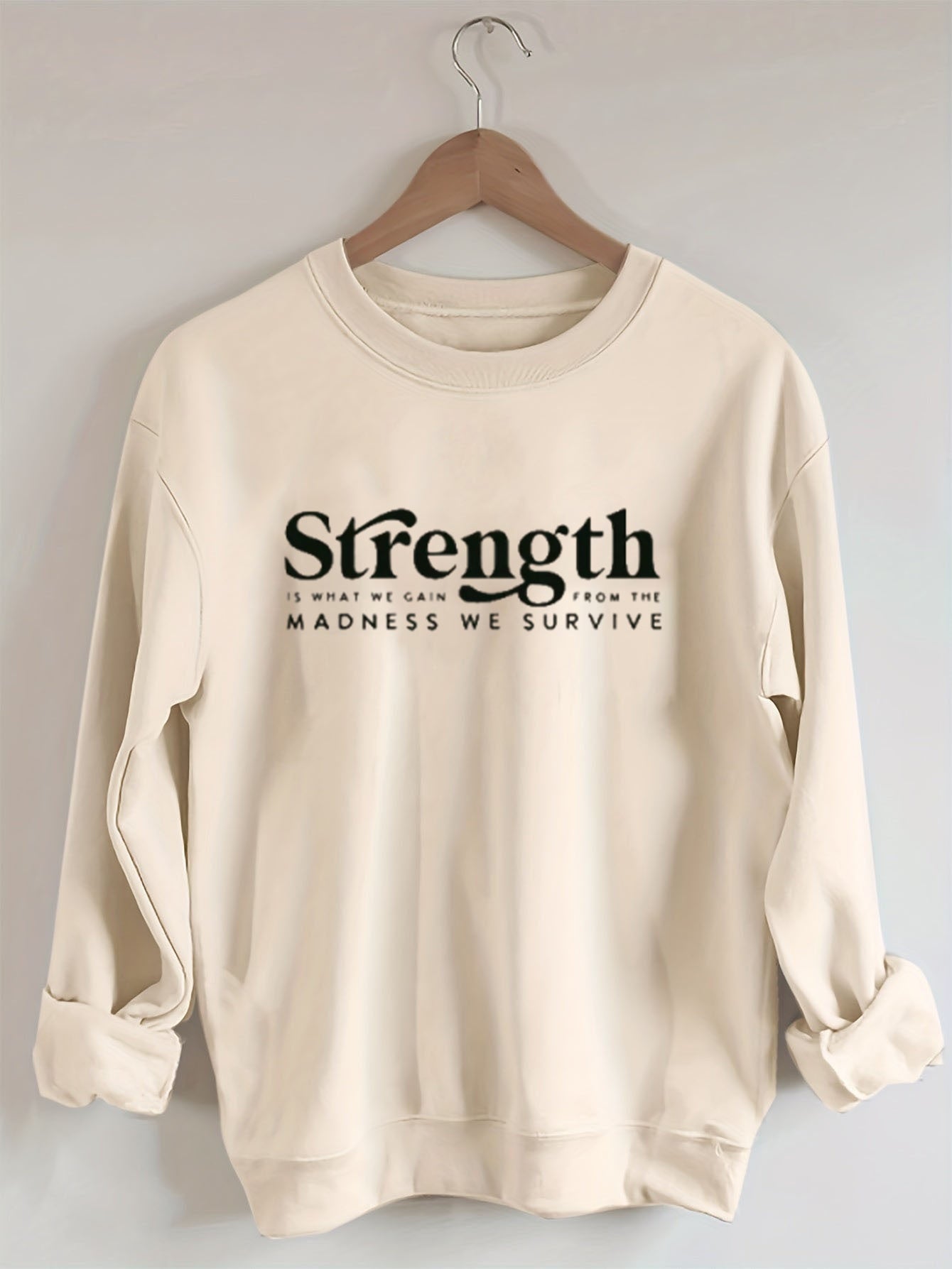 Strength Is What We Gain From The Madness We Survive Sweatshirt