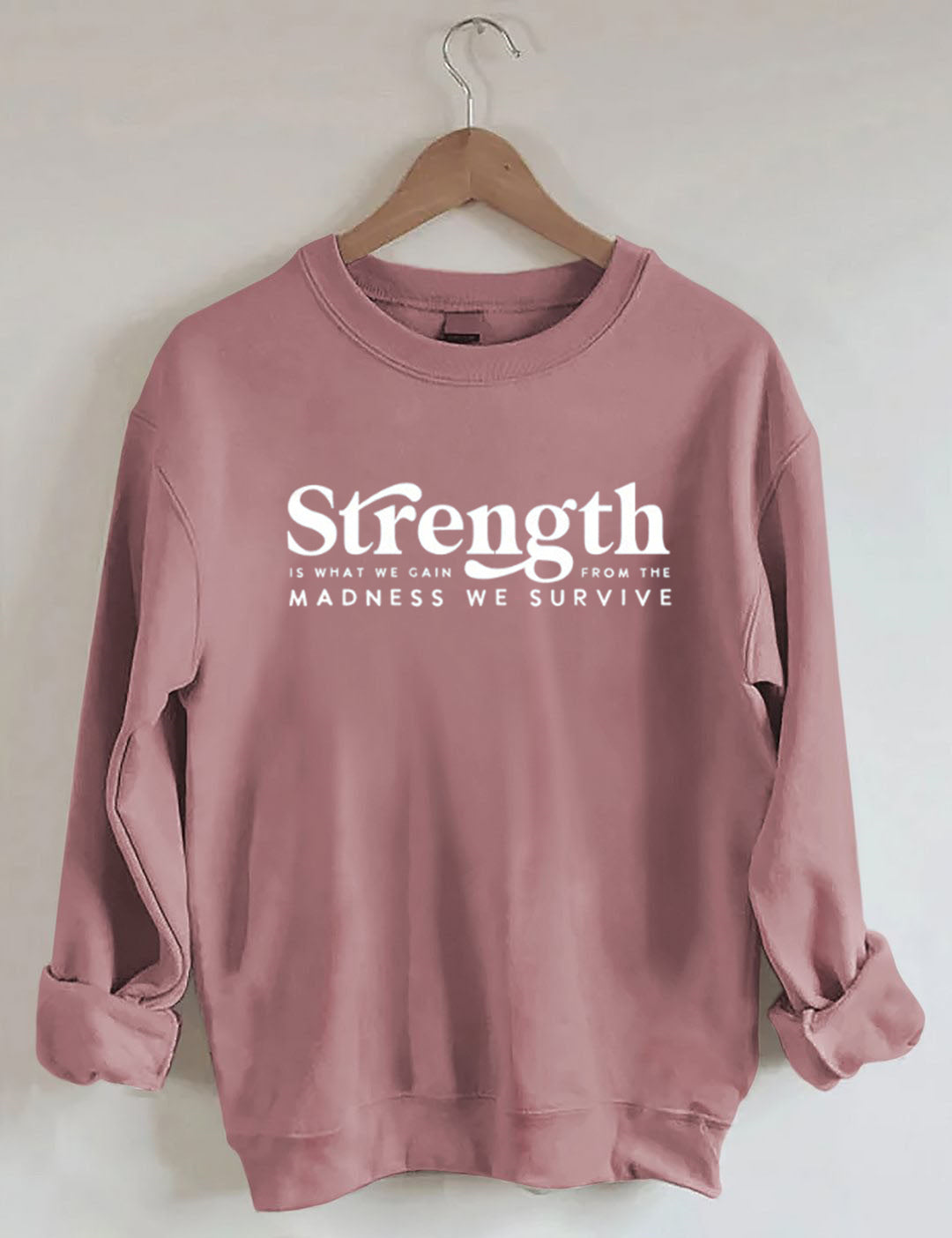 Strength Is What We Gain From The Madness We Survive Sweatshirt