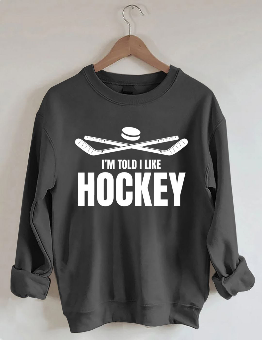 I'm Told I Like Hockey Sweatshirt