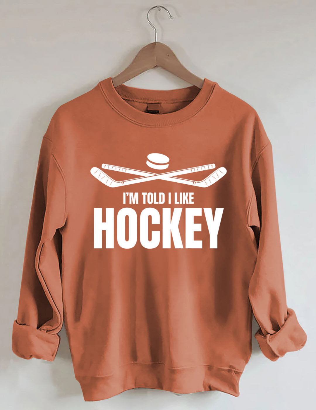I'm Told I Like Hockey Sweatshirt