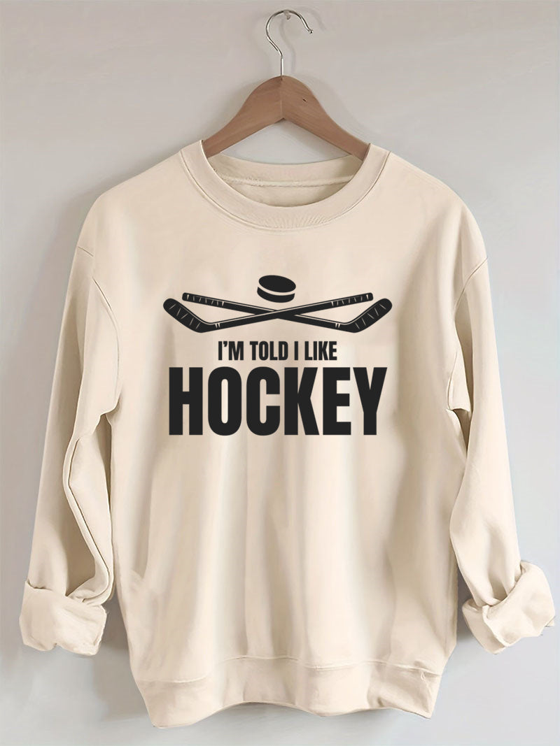 I'm Told I Like Hockey Sweatshirt