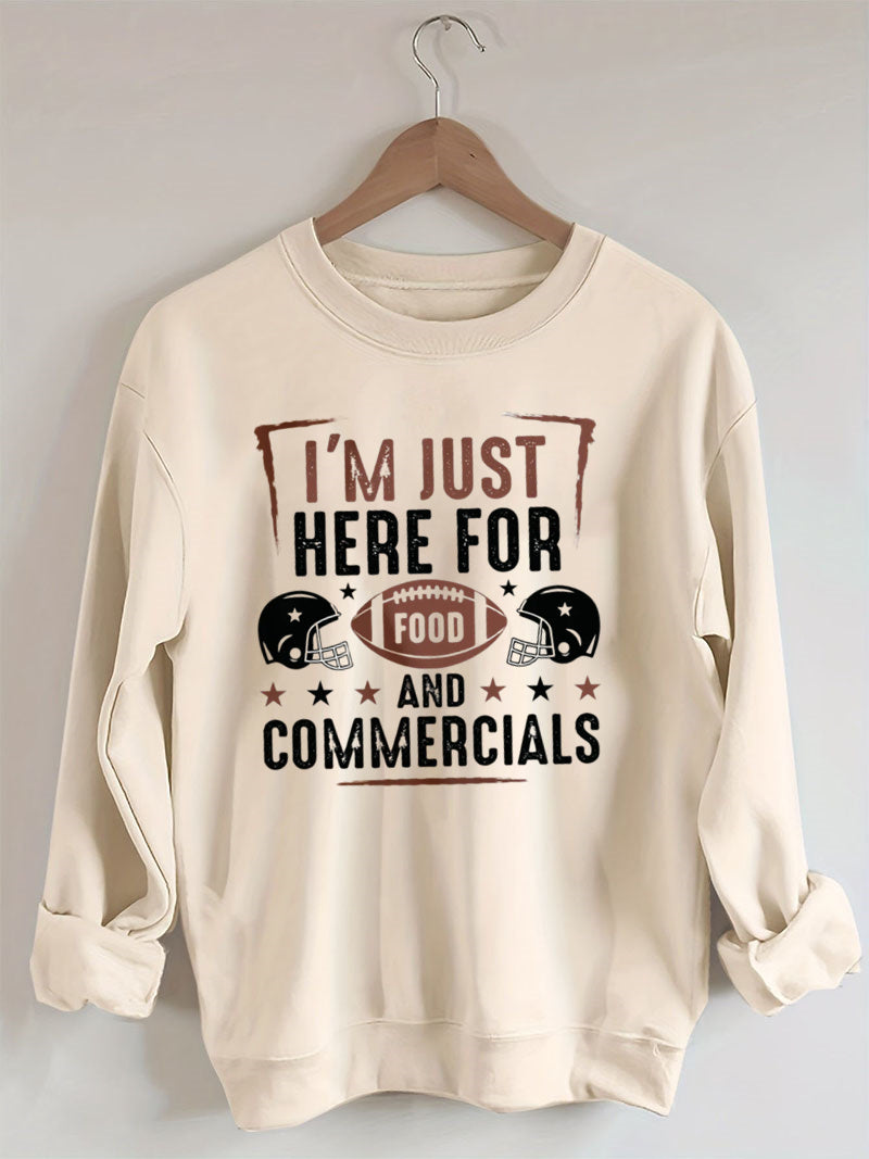 I'm Just Here for the Snacks Football Sweatshirt