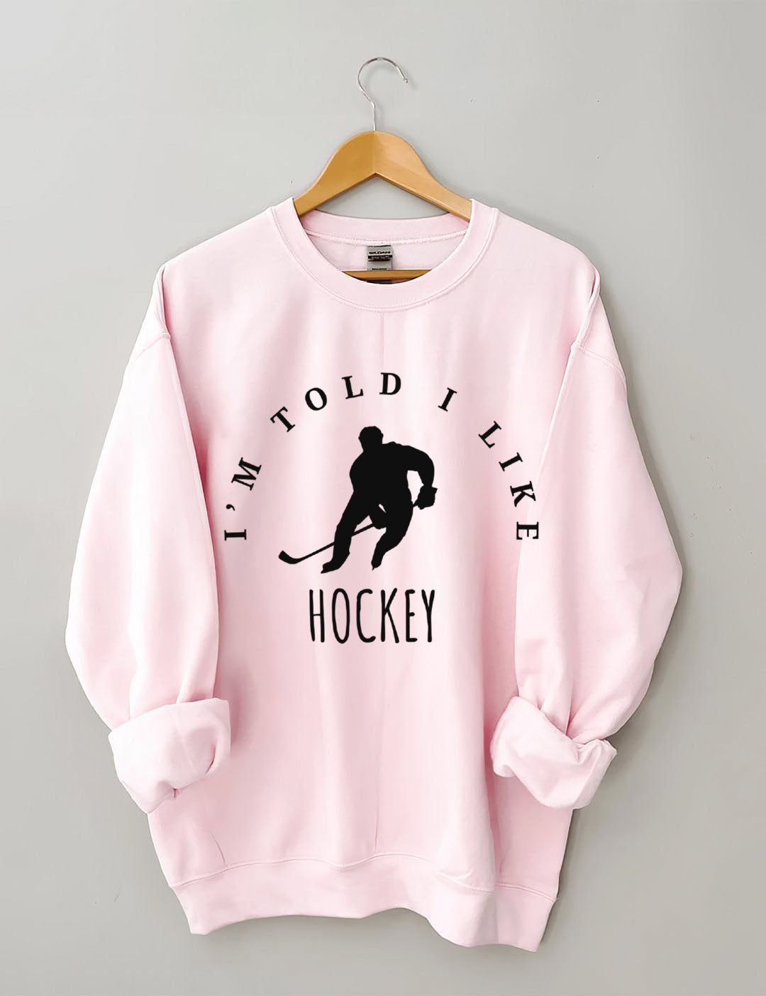 I'm Told I like hockey Sweatshirt