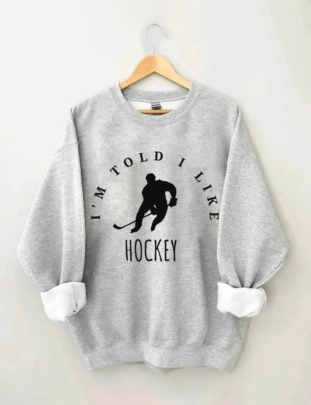 I'm Told I like hockey Sweatshirt