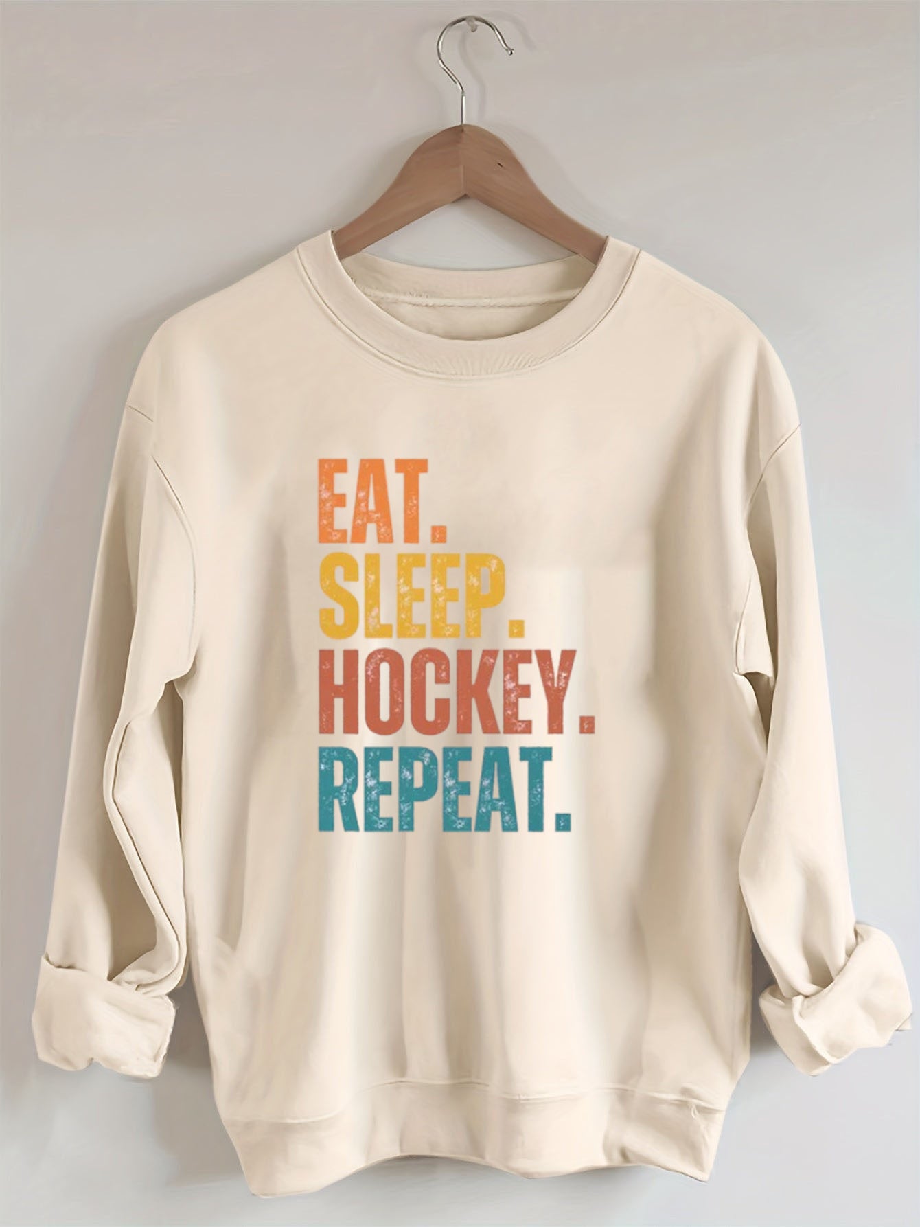 Eat Sleep Hockey Repeat Sweatshirt