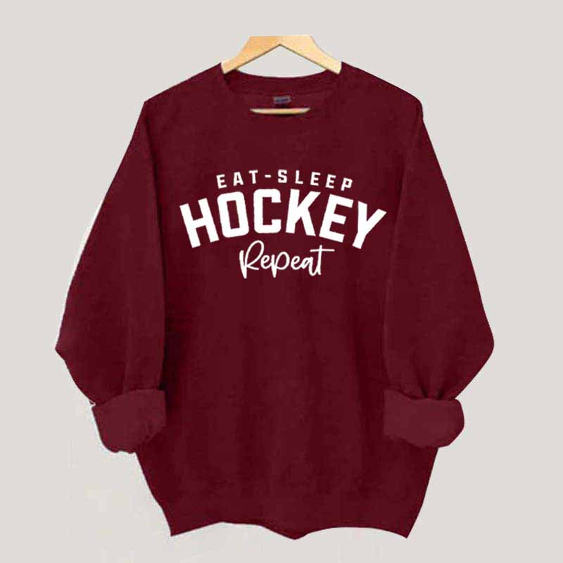 Eat Sleep Hockey Repeat Sweatshirt