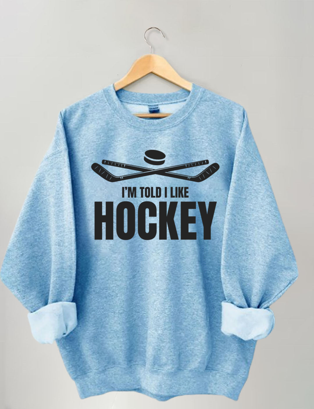 I'm Told I Like Hockey Sweatshirt