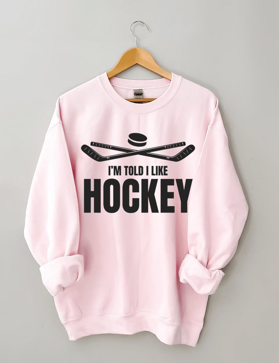 I'm Told I Like Hockey Sweatshirt