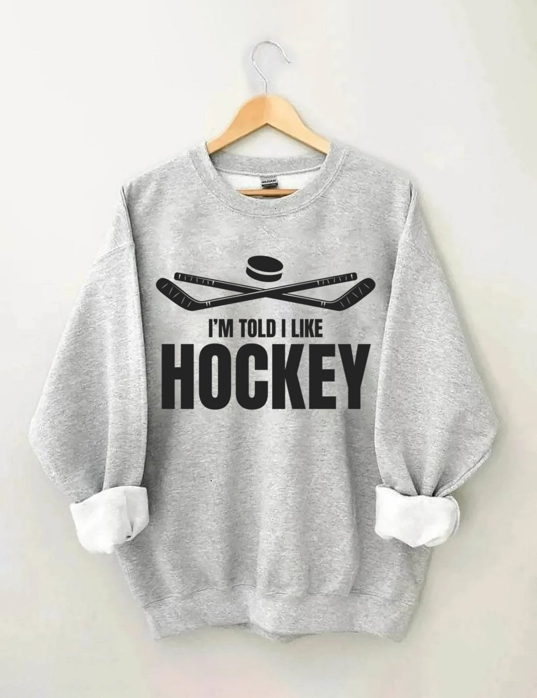 I'm Told I Like Hockey Sweatshirt