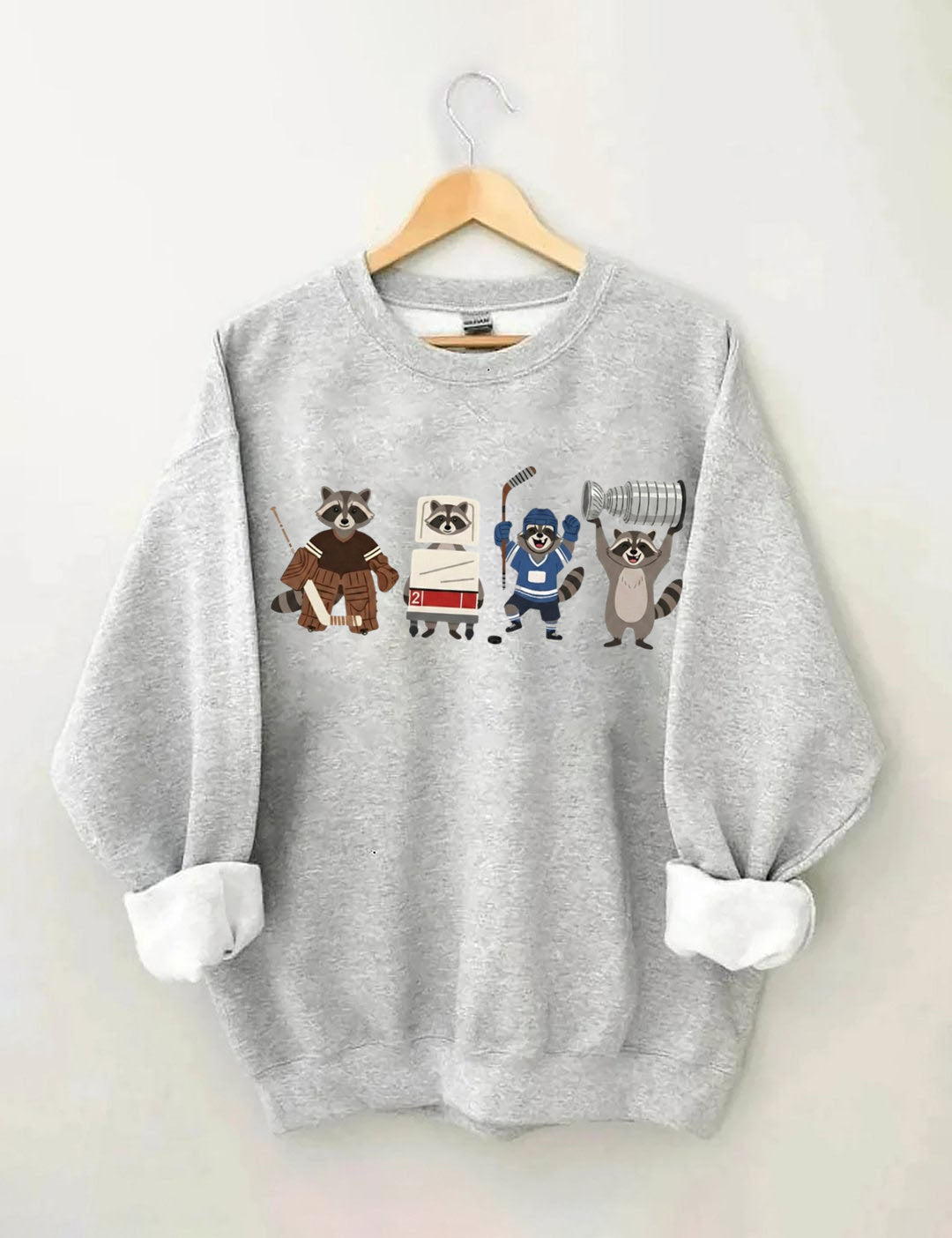 Funny Raccoon Hockey Player Game Day Sweatshirt