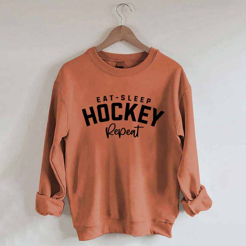 Eat Sleep Hockey Repeat Sweatshirt